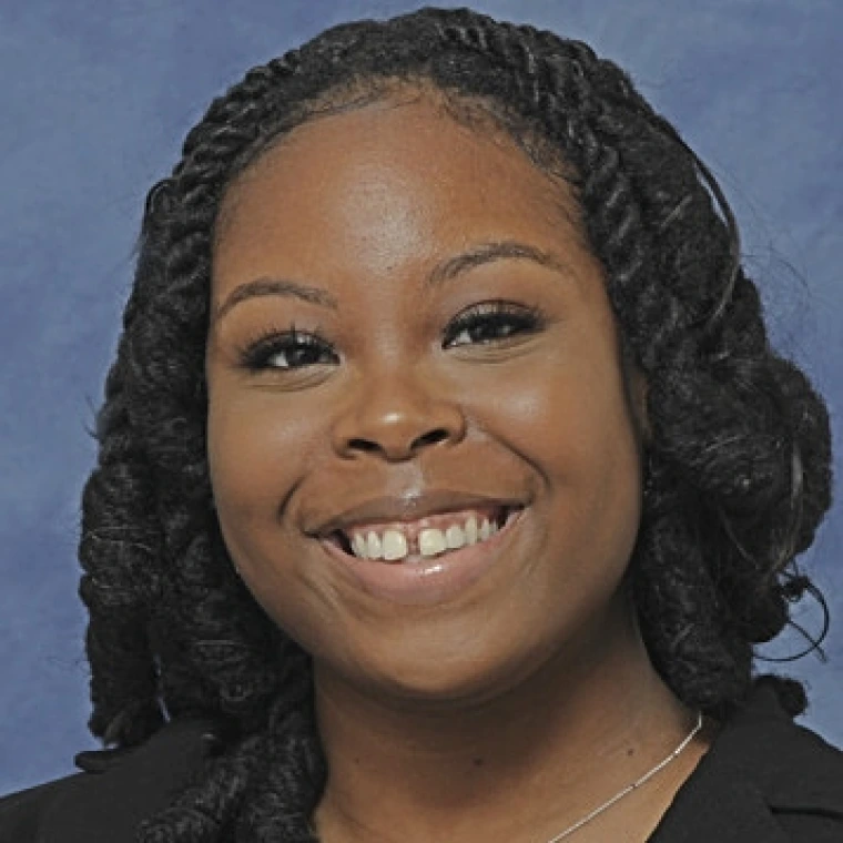 A headshot of Kayla Smith.